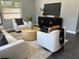 Inviting living room featuring modern decor, comfortable seating, and a stylish entertainment center at 1461 17Th St, Sarasota, FL 34234