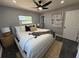 Bedroom featuring a neutral color palette, large windows, and recessed lighting at 1461 17Th St, Sarasota, FL 34234