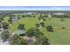Aerial view of park featuring a pond, playground, picnic shelter, sports fields and more at 15032 Skip Jack Loop, Lakewood Ranch, FL 34202