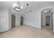 Spacious dining area featuring tile flooring, neutral paint, and modern lighting at 15032 Skip Jack Loop, Lakewood Ranch, FL 34202