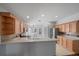 Open kitchen boasts stainless steel appliances and breakfast bar, great for entertaining at 15032 Skip Jack Loop, Lakewood Ranch, FL 34202