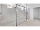 A modern shower with dual shower heads, tile surround, and a glass partition at 1599 Laurel Brook Ln, Port Charlotte, FL 33953