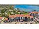 An aerial view of a multi-Gathering condo complex situated on a beautiful waterfront location at 1624 Stickney Point Rd # 24-206, Sarasota, FL 34231