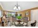 Open-concept living & dining area with ample natural light perfect for entertaining at 1624 Stickney Point Rd # 24-206, Sarasota, FL 34231