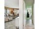 Inviting hallway showcases seamless transition from the living room to the bedrooms at 1624 Stickney Point Rd # 24-206, Sarasota, FL 34231
