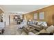 Open concept living and dining room features neutral colors and access to the kitchen at 1624 Stickney Point Rd # 24-206, Sarasota, FL 34231