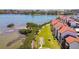 Aerial view of a shuffleboard court and condo community near a scenic waterfront and gorgeous views at 1624 Stickney Point Rd # 24-206, Sarasota, FL 34231