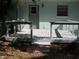 Back deck perfect for outdoor relaxing and entertaining with shade from mature trees at 1805 9Th W St, Palmetto, FL 34221