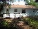 A cozy deck is featured in this quaint backyard at 1805 9Th W St, Palmetto, FL 34221