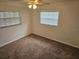 Bedroom featuring carpet, natural light, and a ceiling fan at 1805 9Th W St, Palmetto, FL 34221