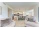 Well-lit kitchen with stainless steel appliances, a breakfast bar, and tiled floors at 18114 Gawthrop Dr # 306, Bradenton, FL 34211