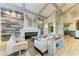 Inviting lounge area with fireplace, modern art, and comfortable seating at 18114 Gawthrop Dr # 306, Bradenton, FL 34211