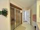 Bathroom featuring a glass-enclosed shower, neutral decor, and tile flooring at 18513 Placid Ave, Port Charlotte, FL 33948
