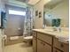 Bathroom featuring a shower and bathtub combination at 18513 Placid Ave, Port Charlotte, FL 33948