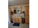 Traditional bathroom with custom cabinetry, a marble countertop, and a shower at 22116 26Th E Ave, Bradenton, FL 34211