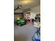 Spacious garage perfect for parking and storage with yard equipment at 22116 26Th E Ave, Bradenton, FL 34211