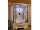 Large modern shower featuring multiple shower heads and a built-in seat at 22116 26Th E Ave, Bradenton, FL 34211