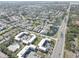 An aerial photograph of the community showcasing mature trees, ponds, and ample parking at 2825 74Th W St, Bradenton, FL 34209