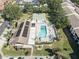 Aerial view of the community pool, shuffleboard courts, clubhouse and car parking at 2825 74Th W St, Bradenton, FL 34209