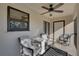 Inviting screened balcony featuring outdoor seating, providing a comfortable space for relaxation at 2825 74Th W St, Bradenton, FL 34209