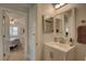 Bathroom with updated vanity and view of the primary bedroom at 2825 74Th W St, Bradenton, FL 34209