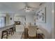 Bright and airy dining area with modern light fixture and comfortable seating for Gathering dining at 2825 74Th W St, Bradenton, FL 34209
