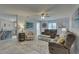 The open-concept living area offers plenty of seating, artwork, and access to the kitchen at 2825 74Th W St, Bradenton, FL 34209