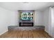 Modern fireplace featuring a flat screen TV, sound bar, and beautiful marble stone accents at 2929 Siesta Dr, Venice, FL 34293