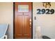 Close-up of the front door with unique nautical accents and modern hardware at 2929 Siesta Dr, Venice, FL 34293