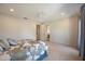 Minimalist bedroom with carpet, simple decor, and an attached bathroom at 340 Osprey Point Dr, Osprey, FL 34229