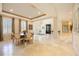 Large dining area featuring a round table, chairs and a view to the foyer at 340 Osprey Point Dr, Osprey, FL 34229
