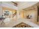 Grand foyer with soaring ceilings, staircase, marble floors, and elegant chandelier at 340 Osprey Point Dr, Osprey, FL 34229