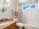 Well-lit bathroom with granite countertop and tub-shower combo at 355 Melrose Ct, Venice, FL 34292