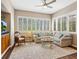 Inviting living room with plantation shutters allowing natural light and comfortable seating, perfect for relaxation at 355 Melrose Ct, Venice, FL 34292