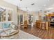 Open-concept living space blending dining, kitchen, and living room areas, ideal for modern living at 355 Melrose Ct, Venice, FL 34292