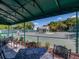 Enjoy tennis matches from the shaded patio overlooking the community court at 355 Melrose Ct, Venice, FL 34292