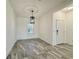 Charming dining area with tile floors, neutral walls and modern light fixture at 3706 Shimmering Oaks Dr, Parrish, FL 34219