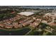 A beautiful aerial view of the community and its ponds, near a large shopping center and Tampa Bay at 4236 Expedition Way # 106, Osprey, FL 34229