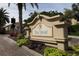 An attractive community entrance sign with lush landscaping and a welcoming atmosphere at 4236 Expedition Way # 106, Osprey, FL 34229