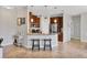Stylish kitchen with granite countertops, pendant lighting, and stainless steel appliances at 4236 Expedition Way # 106, Osprey, FL 34229