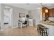 Inviting living space with tiled floors, work space, and natural light at 4236 Expedition Way # 106, Osprey, FL 34229