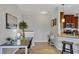 Bright room boasts tile floors, modern decor, and functional desk setup at 4236 Expedition Way # 106, Osprey, FL 34229