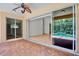 Inviting brick patio with seamless access to the home, and a view of the refreshing pool at 4713 Sweetmeadow Cir, Sarasota, FL 34238