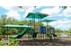 Community playground with slide and covered play areas at 4713 Sweetmeadow Cir, Sarasota, FL 34238