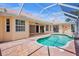 Outdoor pool and patio with screened enclosure, perfect for enjoying the Florida sunshine at 4713 Sweetmeadow Cir, Sarasota, FL 34238