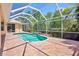 Private screened-in pool and patio area, perfect for outdoor entertaining at 4713 Sweetmeadow Cir, Sarasota, FL 34238