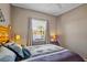 Comfortable bedroom with view to the water at 4961 Sabal Lake Cir, Sarasota, FL 34238