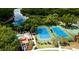 Aerial view of community amenities including tennis, basketball, and pool at 4961 Sabal Lake Cir, Sarasota, FL 34238