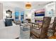 Inviting living area with a fireplace, built-in shelving, and cozy seating, creating a comfortable and stylish space at 497 Island Cir, Sarasota, FL 34242
