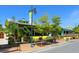 Charming multi-colored restaurant with outdoor seating and lush landscaping under a clear blue sky at 497 Island Cir, Sarasota, FL 34242